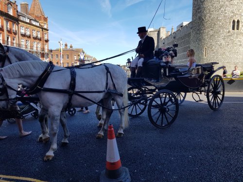 TV celebrity Amanda Holden in a carriage outside the castle